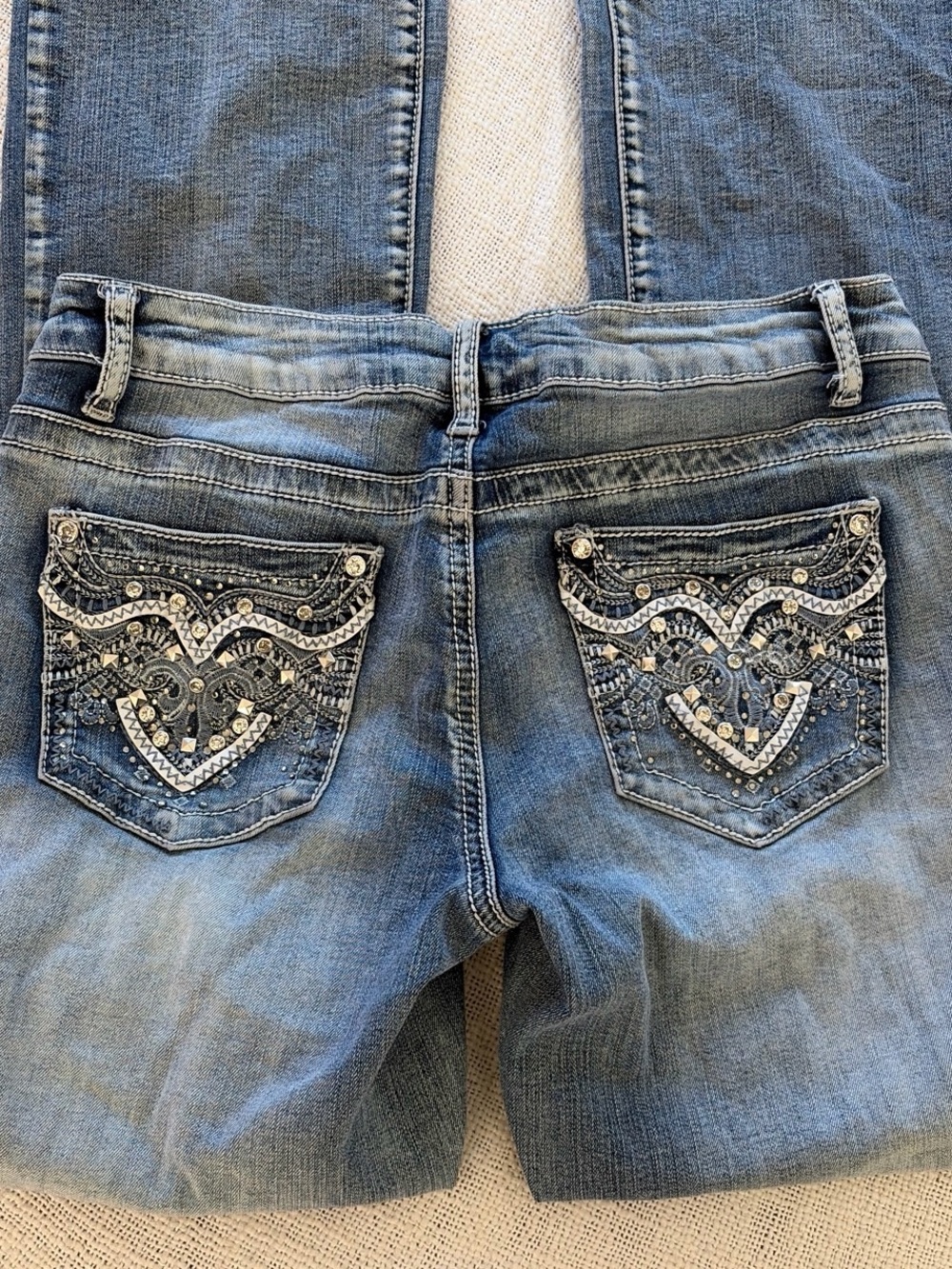 Embellished Light Blue Women's Jeans with Decorative Back Pockets